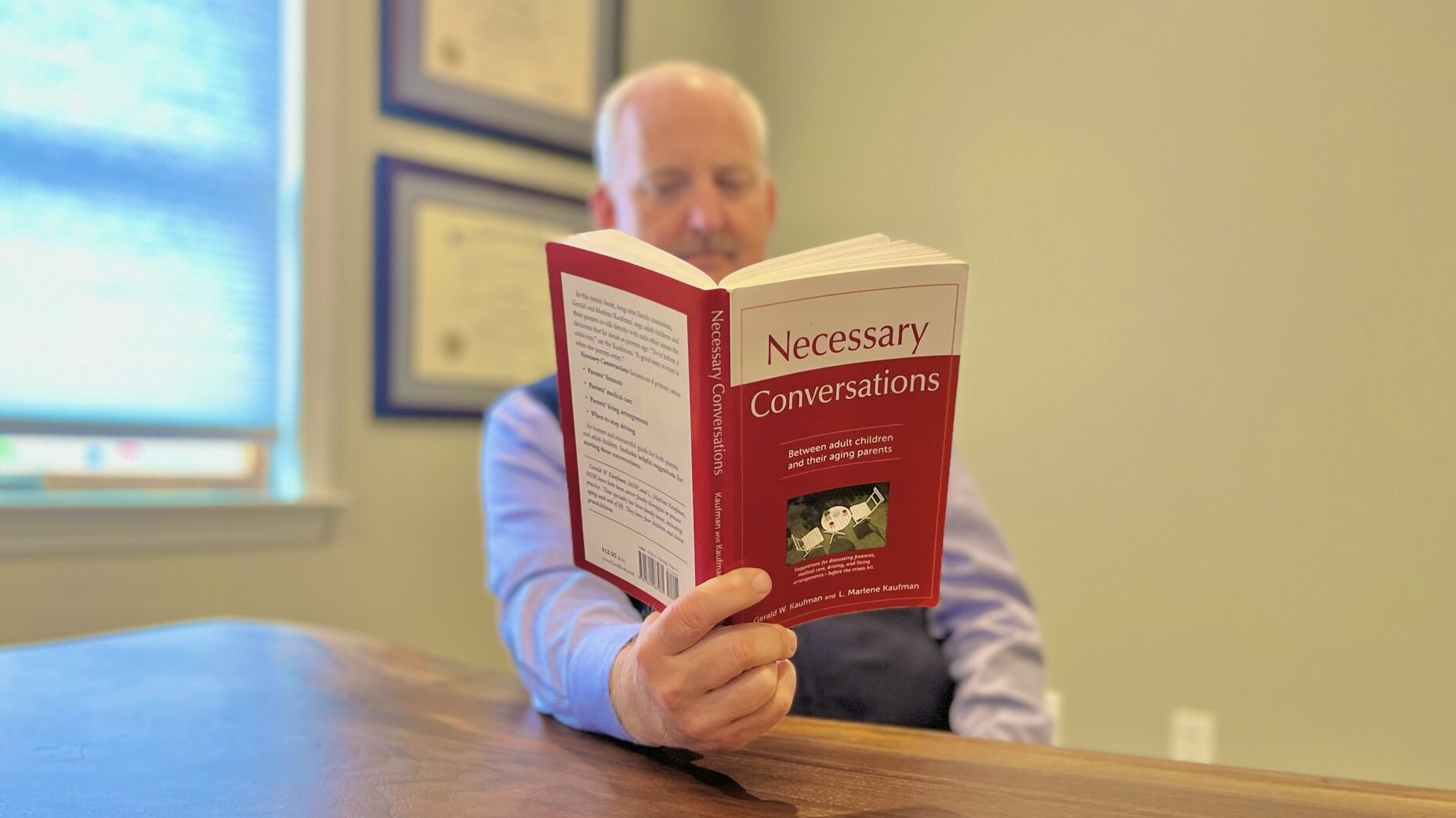 A man reading a book.