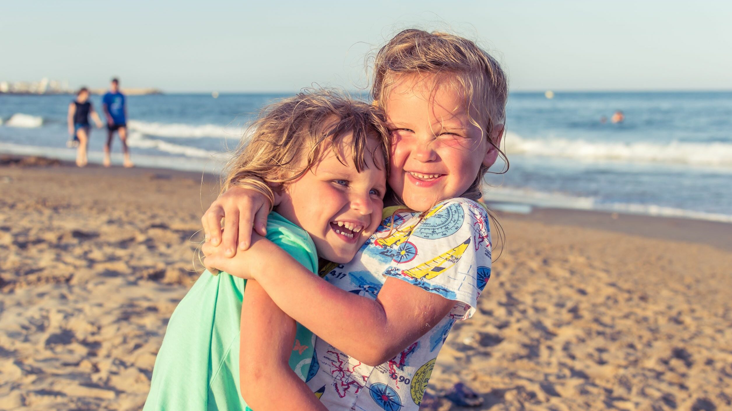 Children playing on a beach.