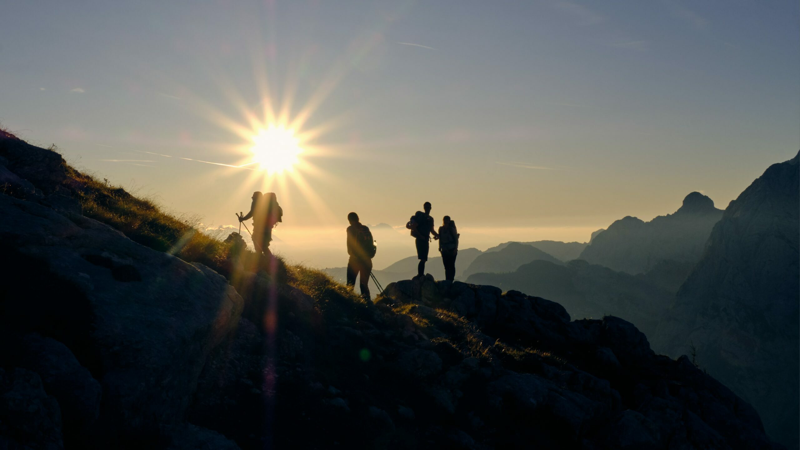 People at the top of a hill.